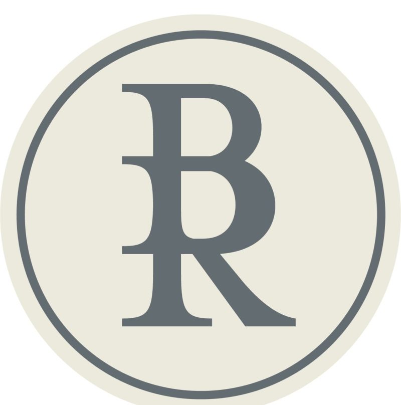 Logo of SharpShell Digital featuring a stylized "R" in a circular design, representing the brand's identity in web design and development services.