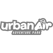 Urban Air Adventure Park logo showcasing playful typography and a leaf icon, representing a fun and adventurous brand identity for family entertainment and activities.